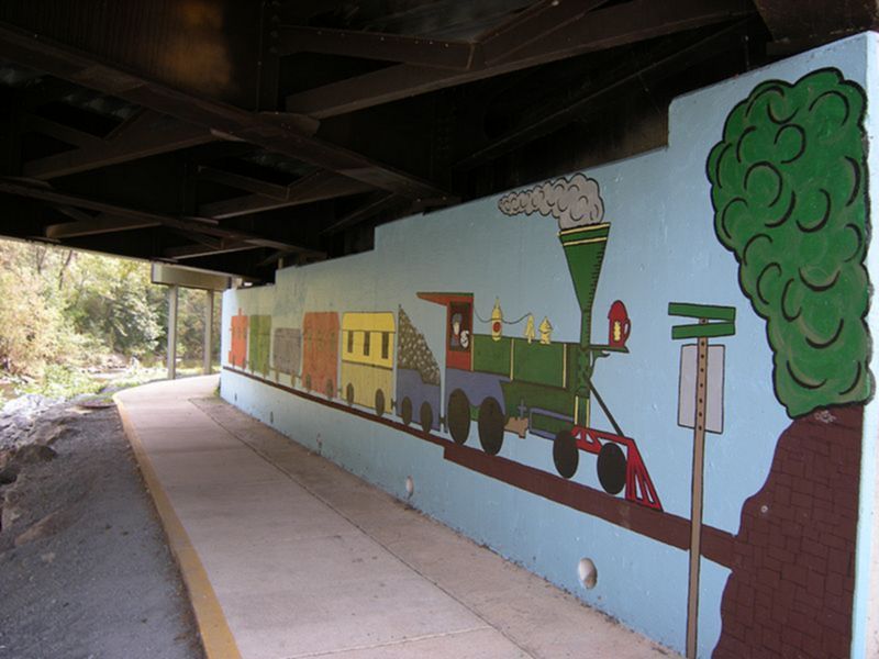 Bridge Train Mural on Hawksbill Greenway